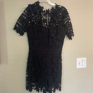 Black super cute lace romper worn once. Just doesn’t fit me anymore. Size small